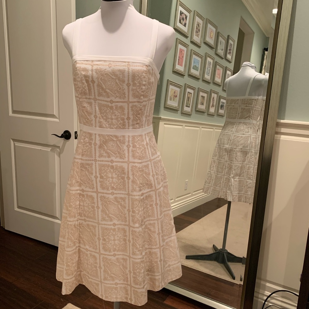 Size 4 cotton tan and white printed LOFT sundress.